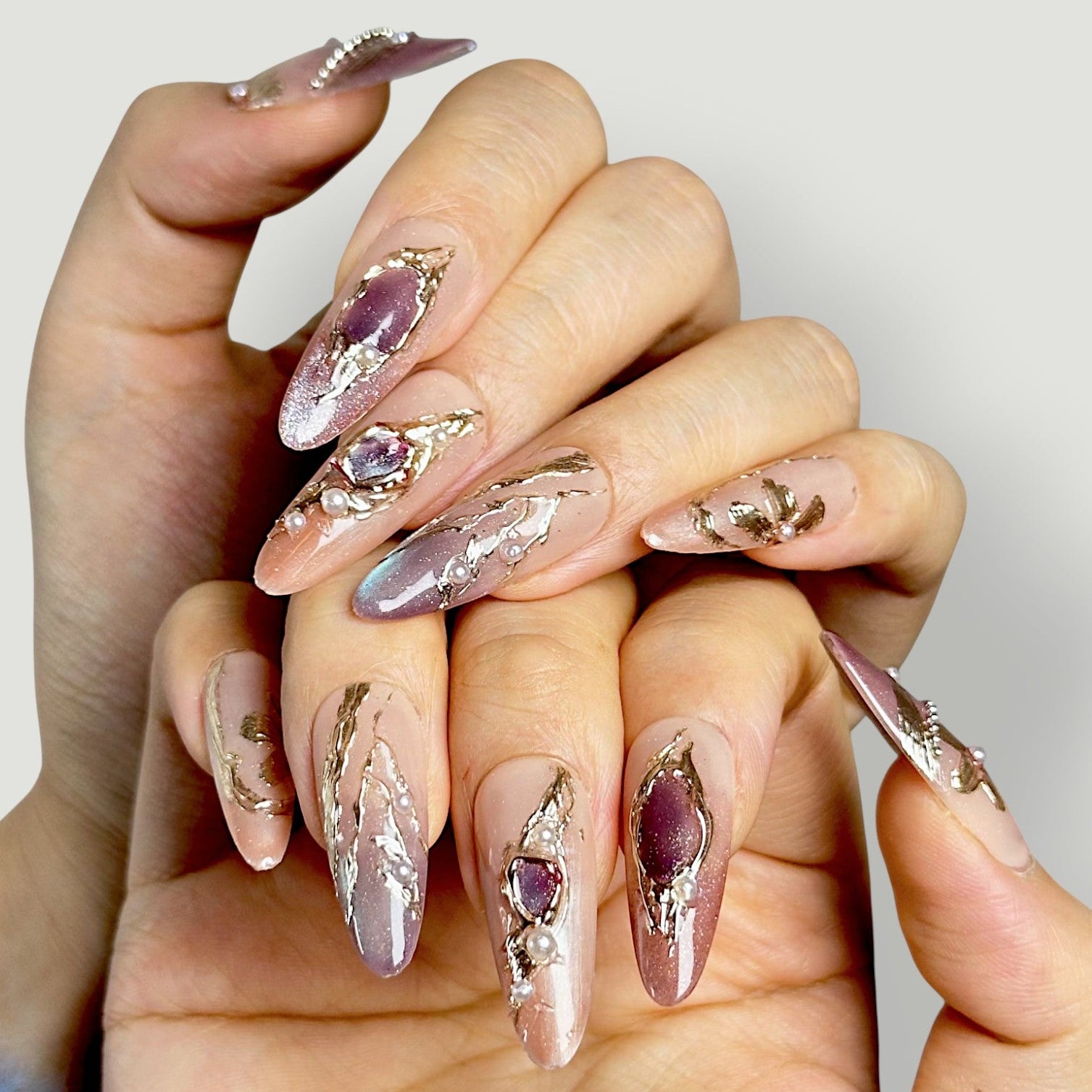 Velvetkay Gilded Mirage handcrafted press-on nails. Elegant reusable manicure with gold details.