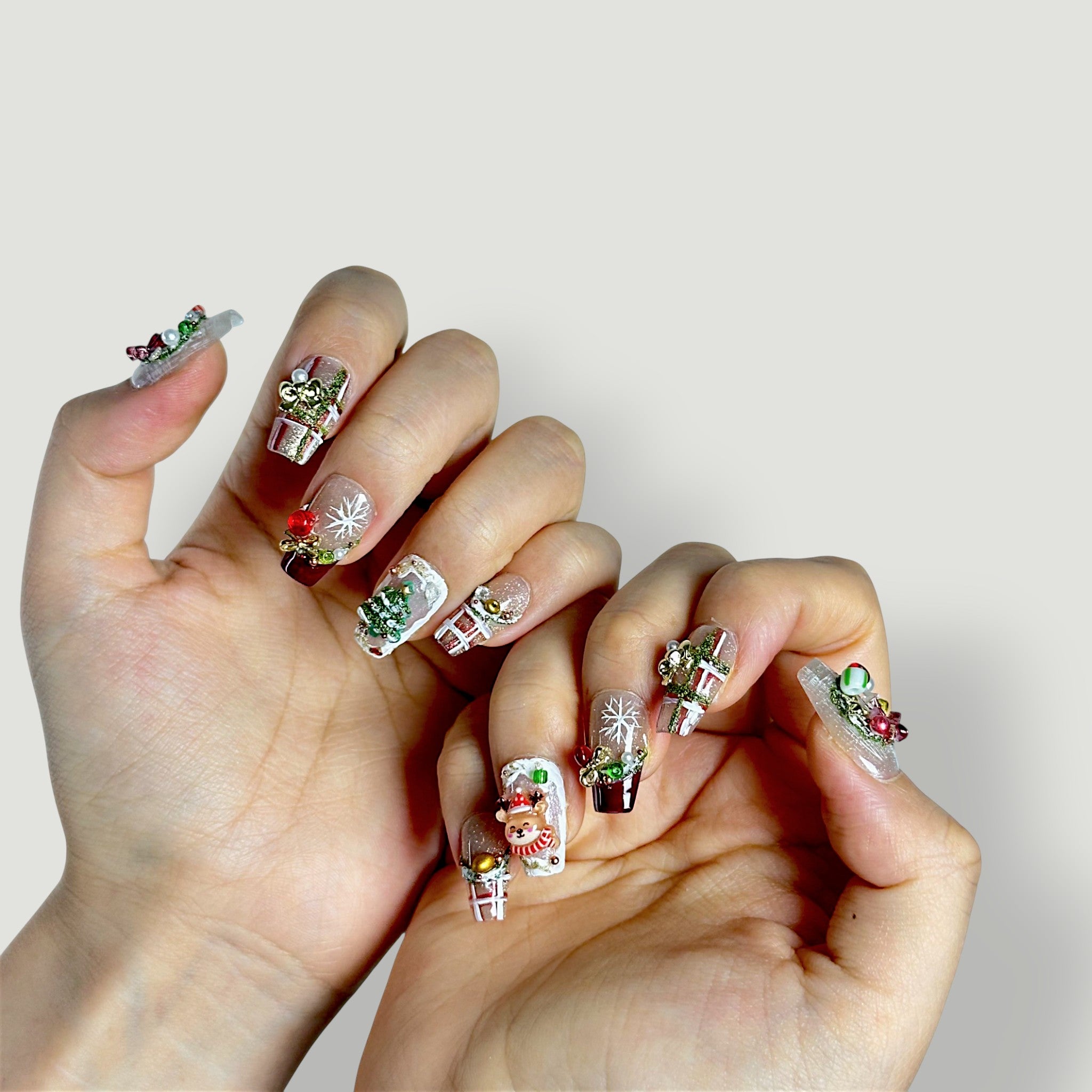 Close-up of Velvetkay Holiday Jubilee press-on nails. Festive luxury design with seasonal accents.