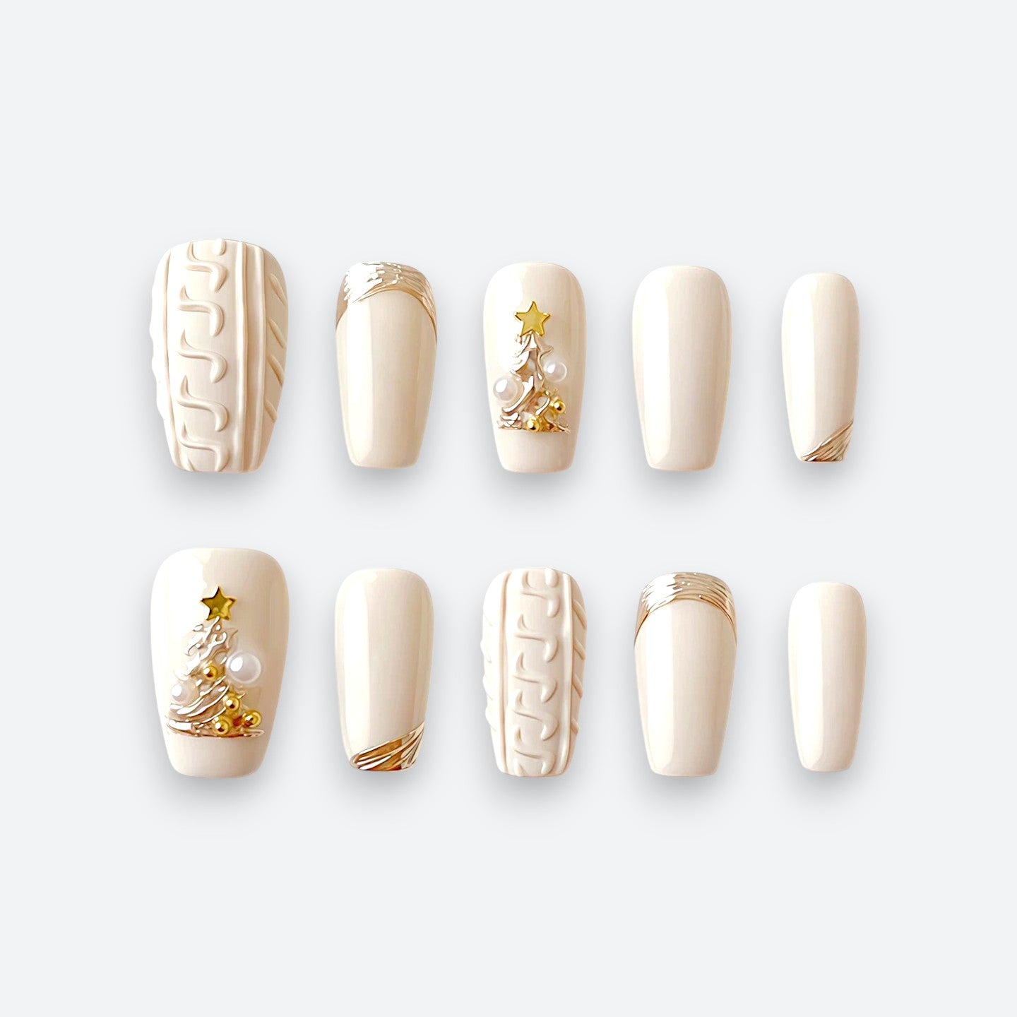 Full set of Velvetkay Ivory handcrafted press-on nails in Coffin shape. Minimalist white reusable manicure.