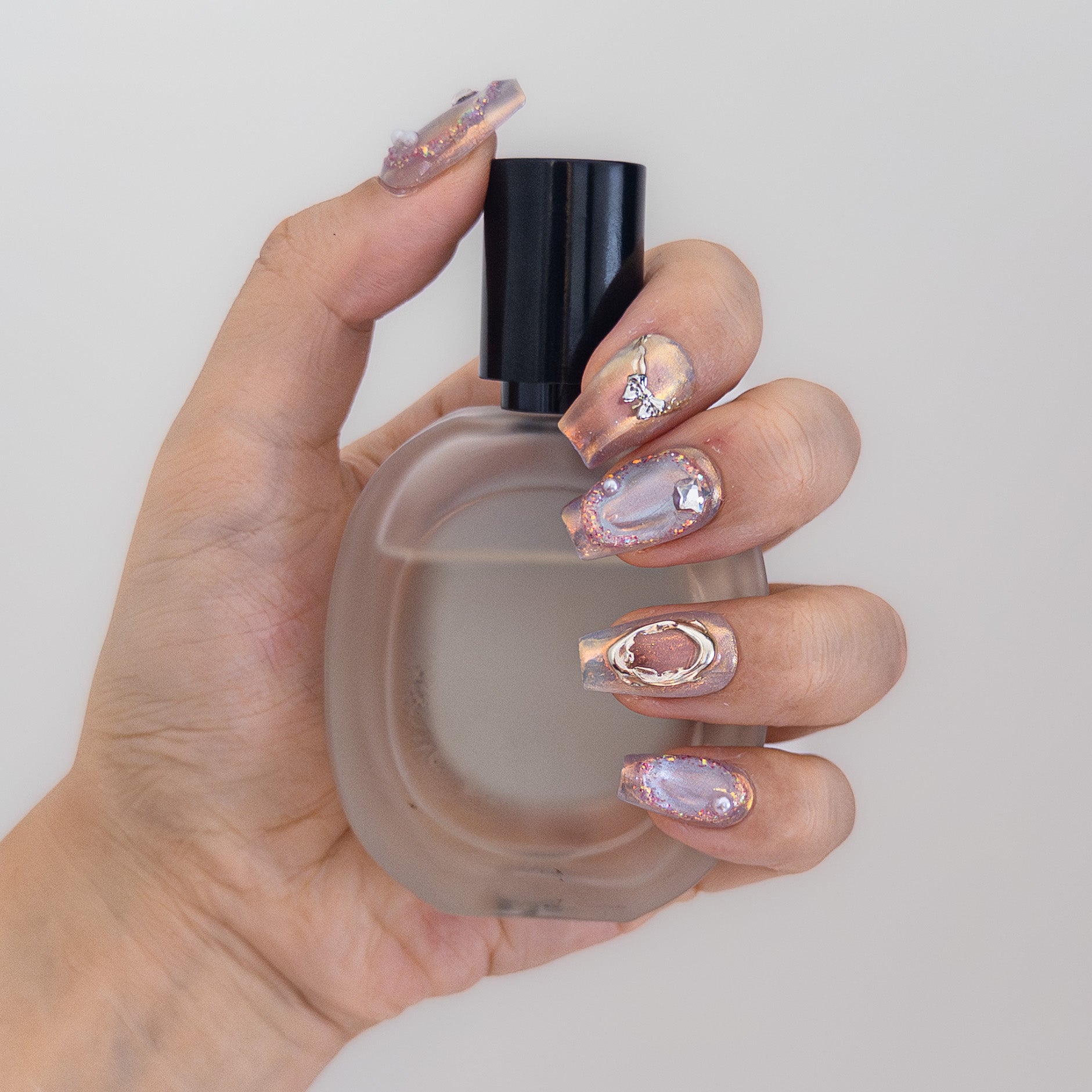 Translucent purple layered gel showing depth and light reflection on custom fit handcrafted faux-acrylic nails.