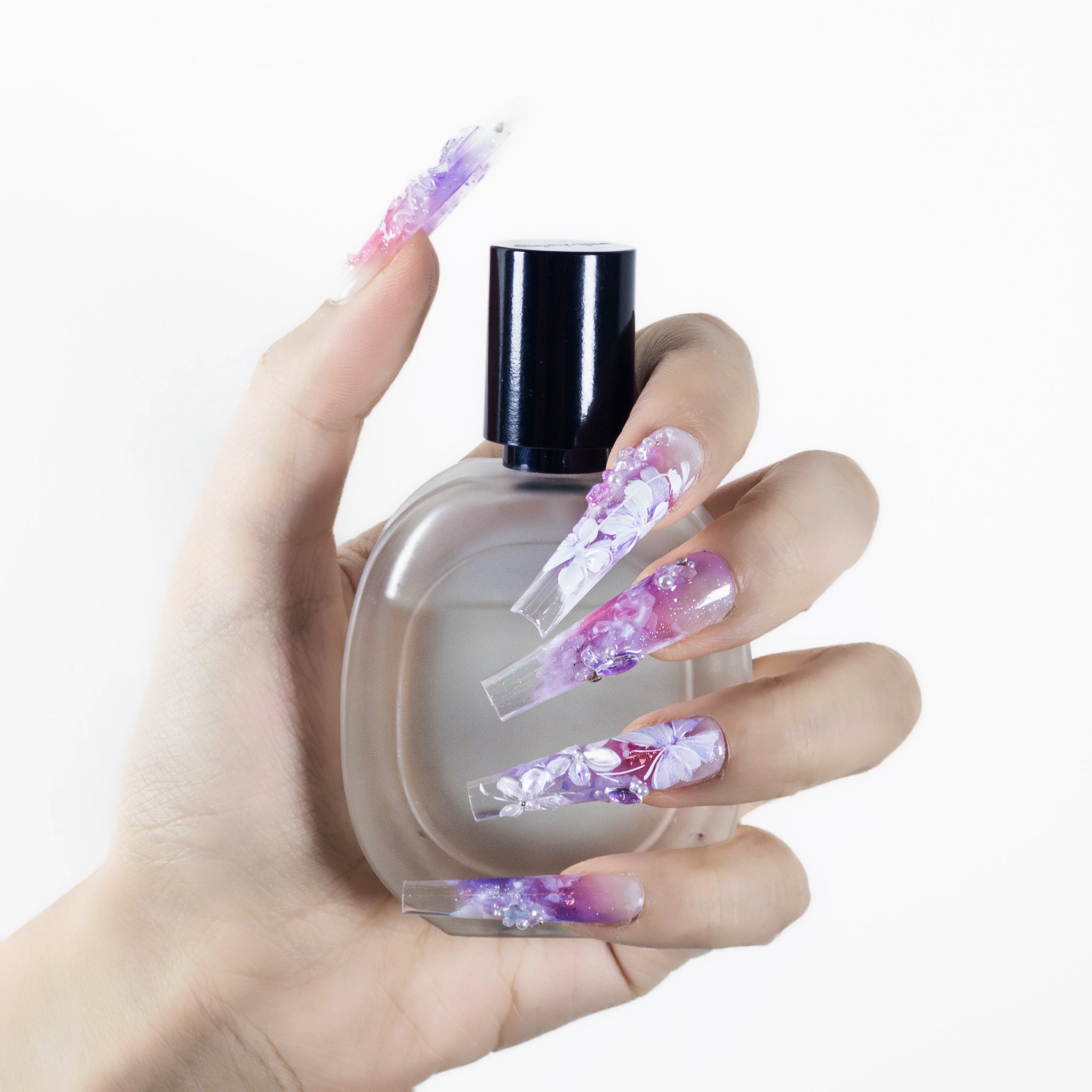 Velvetkay Purple Butterfly handcrafted press-on nails in Coffin shape. Close-up of the delicate butterfly art design.