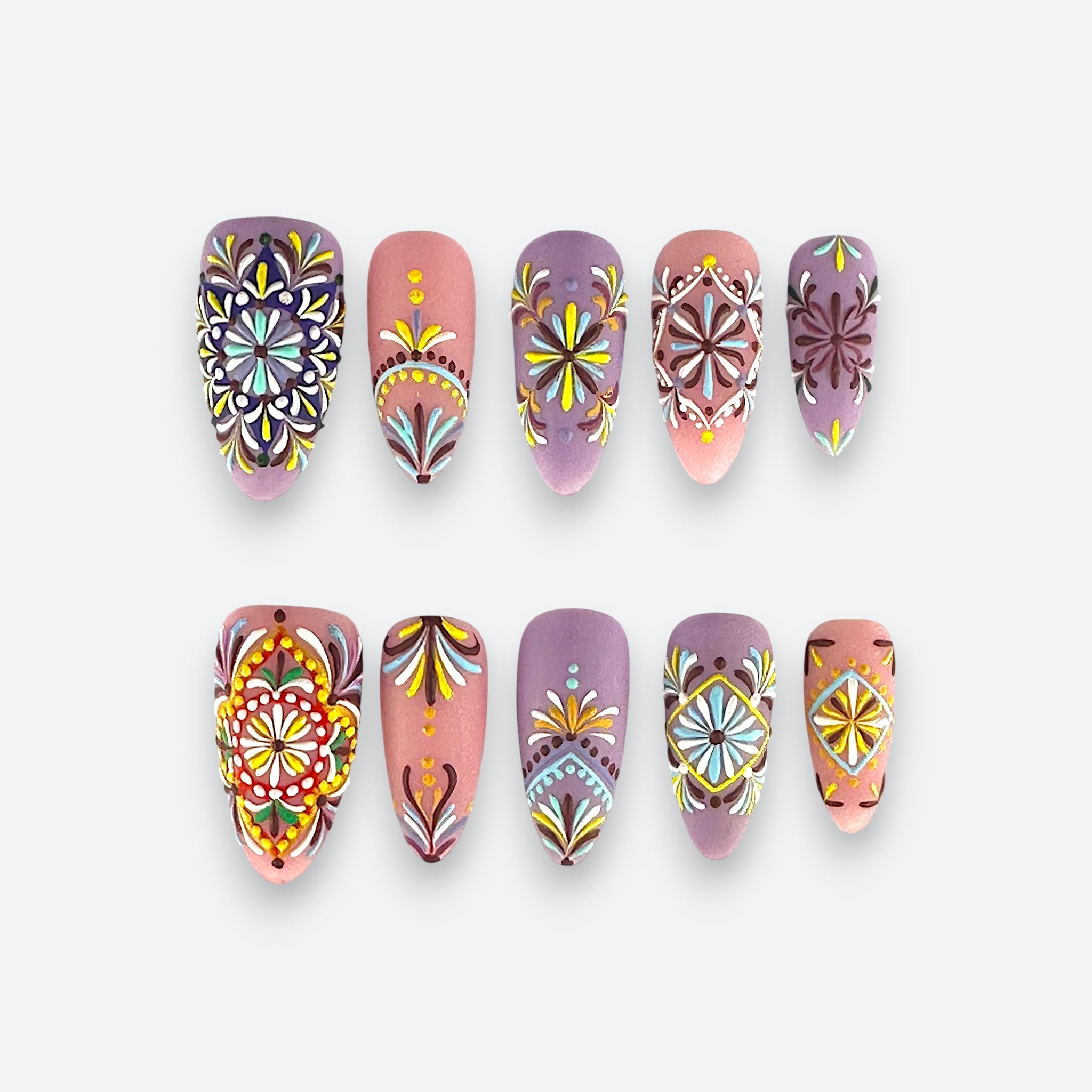 Full set view of Velvetkay Rosette handcrafted press-on nails in Almond shape. Romantic floral design.