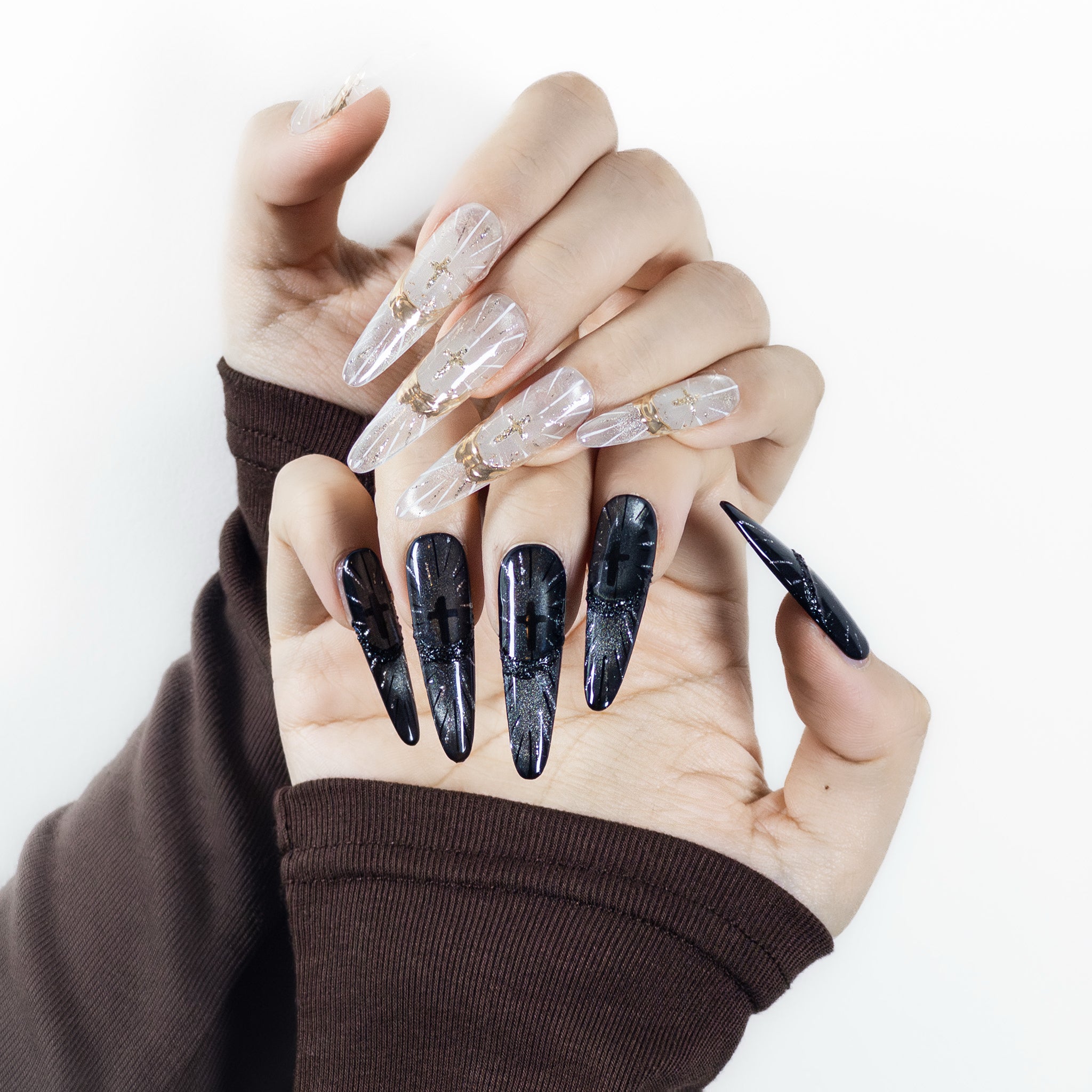 Close-up detail of Velvetkay Sanctum Glow press-on nails in Stiletto shape, showing handcrafted texture and edge finish.