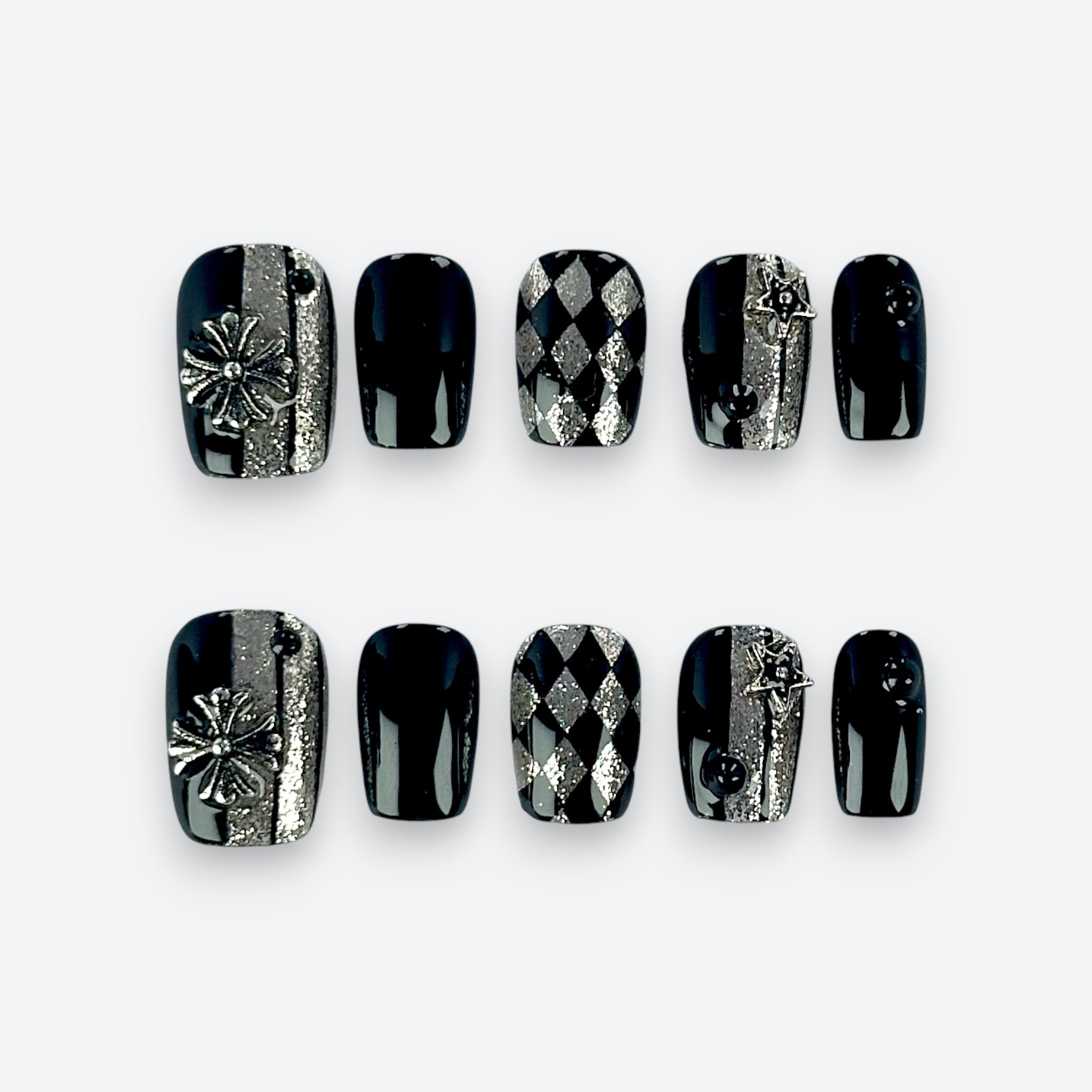 Velvetkay Spark press-on nails full set in Square shape. Modern dark luxury design with handcrafted details.