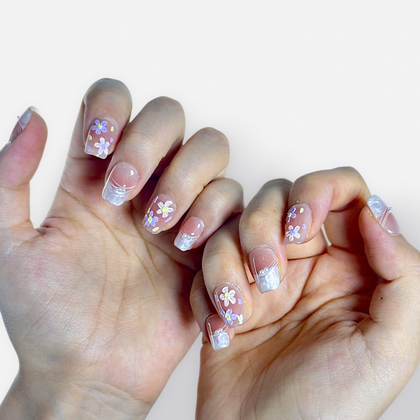 Blush Meadow delicate hand-painted floral press-on nails with 3D pearl accents and textured french tip, square shape structured gel by Velvetkay.