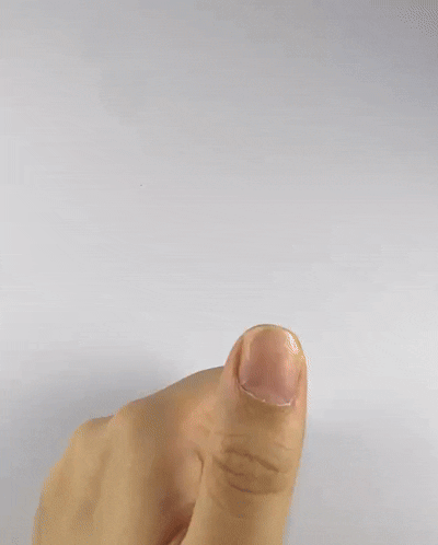 Step 2 of applying Velvetkay press-on nails: Buffing the natural nail for better adhesion with tabs.