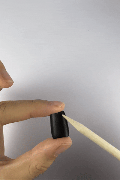 How to care for Velvetkay press-on nails: Cleaning the back of the nail after removal.