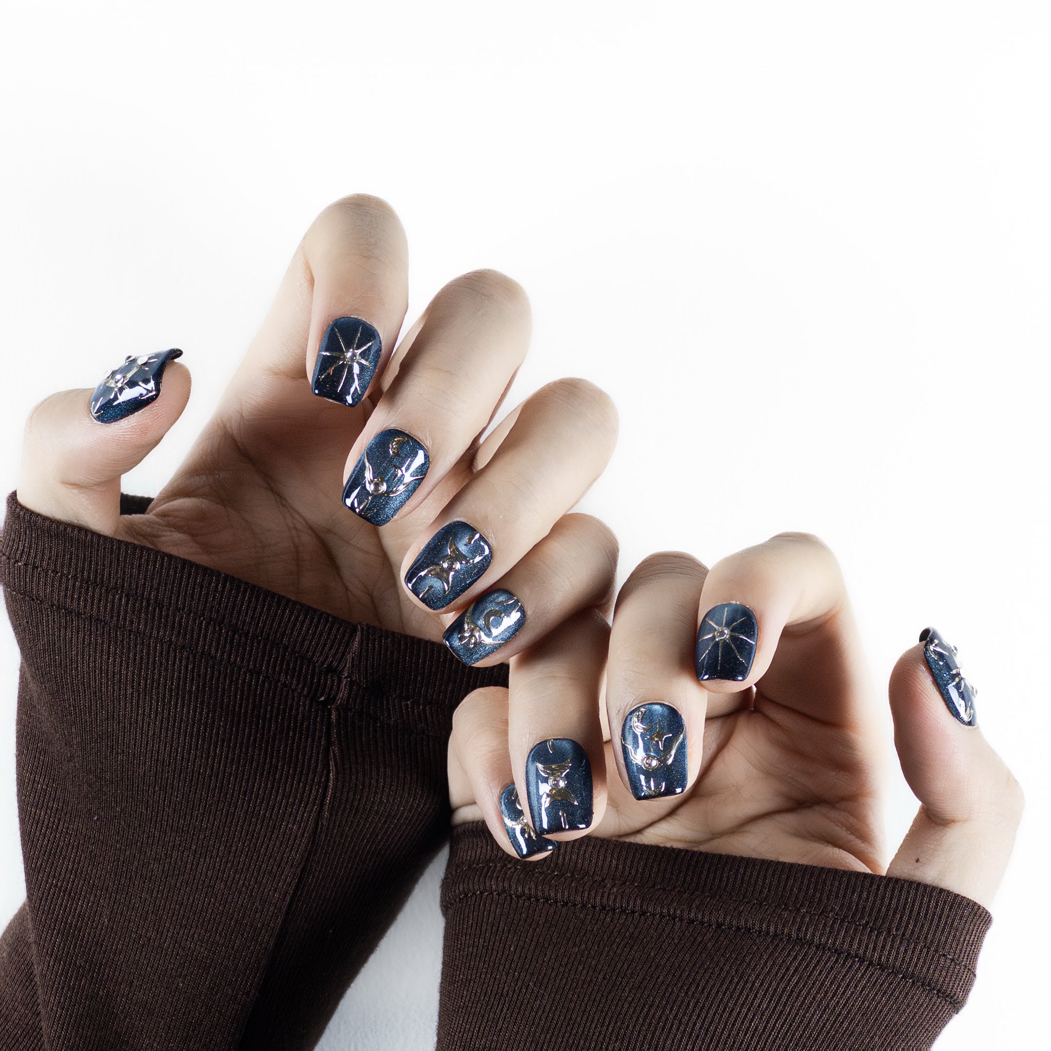 Velvetkay Astral Vault handcrafted press-on nails. Modern celestial-inspired reusable manicure.