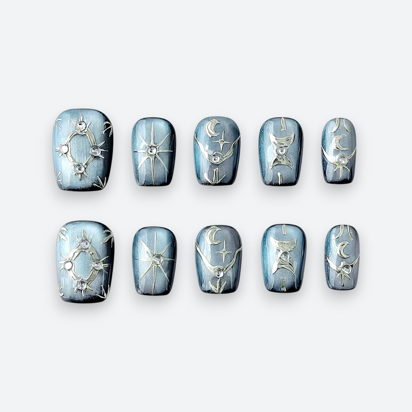 Full set layout of Velvetkay Astral Vault handcrafted press-on nails in Square shape. Galaxy-inspired design.