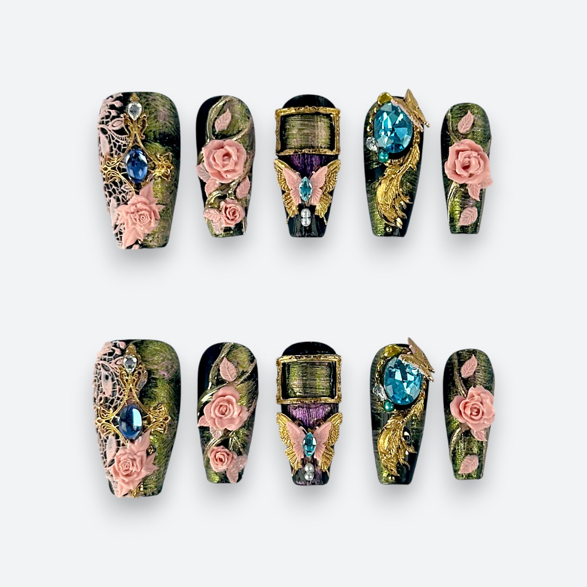 Full set layout of Velvetkay Baroque Rose press-on nails in Coffin shape. Elegant ornate details.