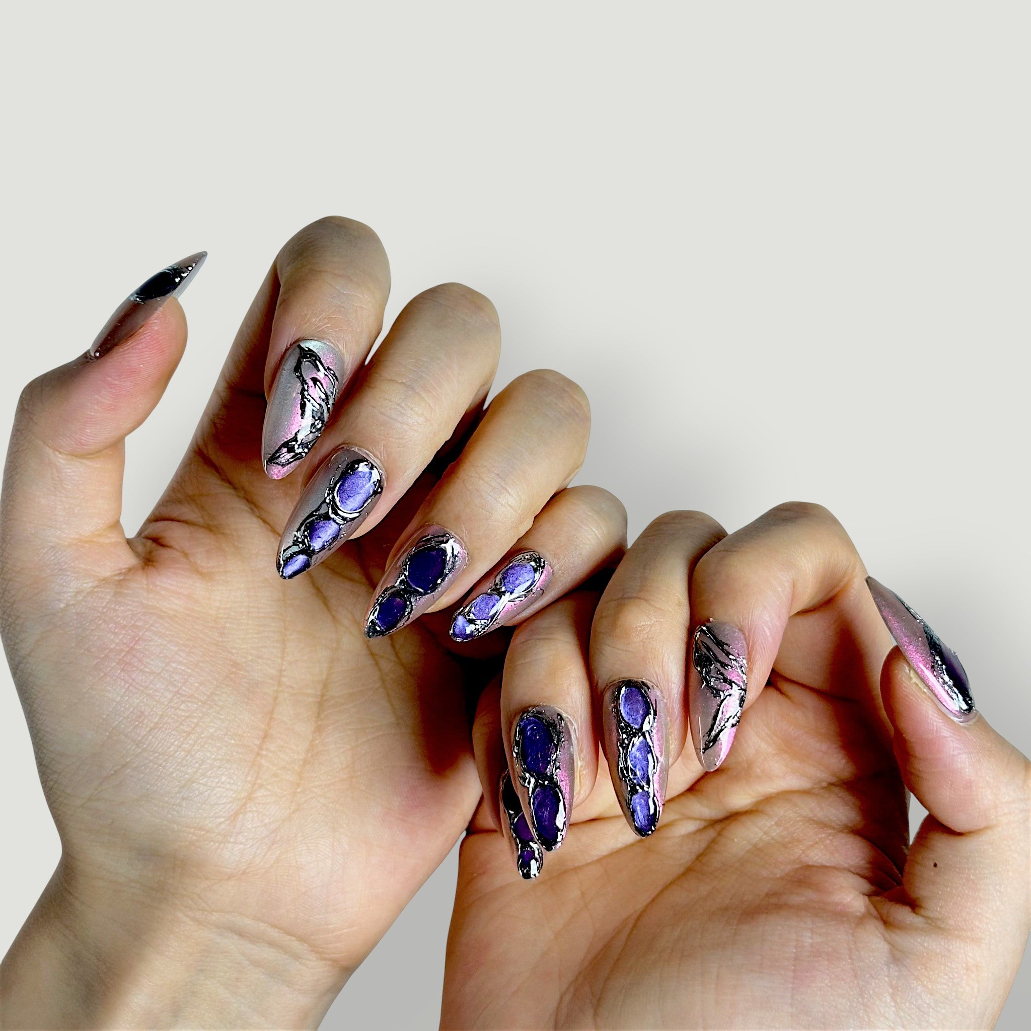 Texture shot of Velvetkay Gemstone nails, showing the layered salon-quality finish on Almond shape.