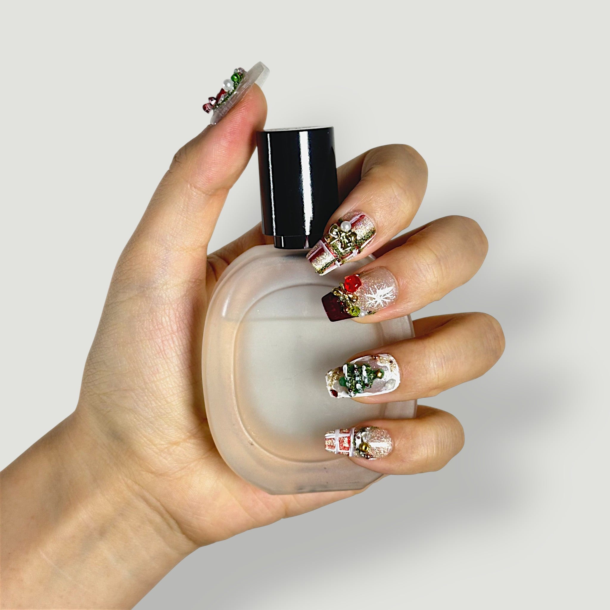 Detail texture shot of Velvetkay Holiday Jubilee nails, handcrafted for a premium holiday look.