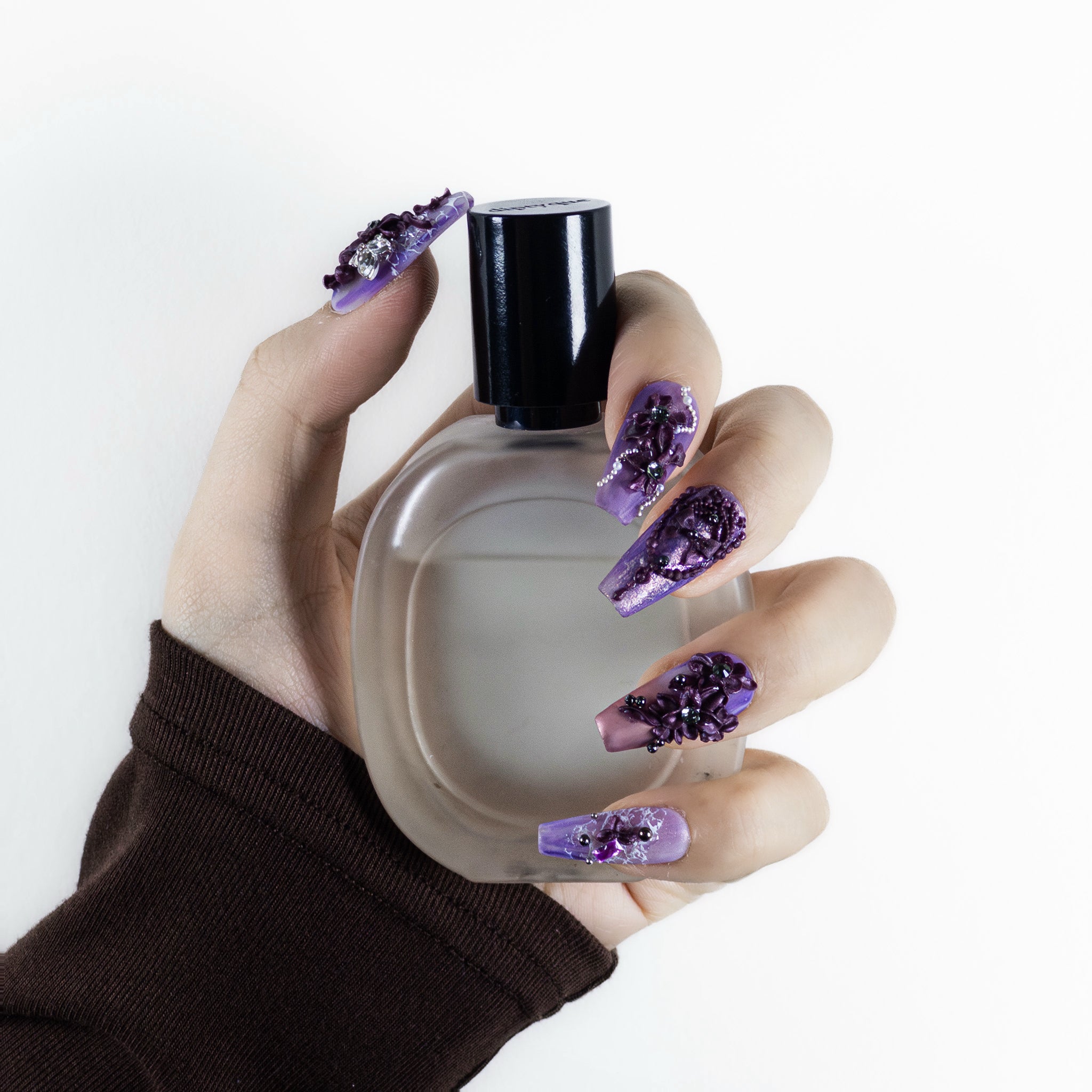 Detail view of Velvetkay Lavender Drift press-on nails in Coffin shape, showing the smooth, salon-grade surface.