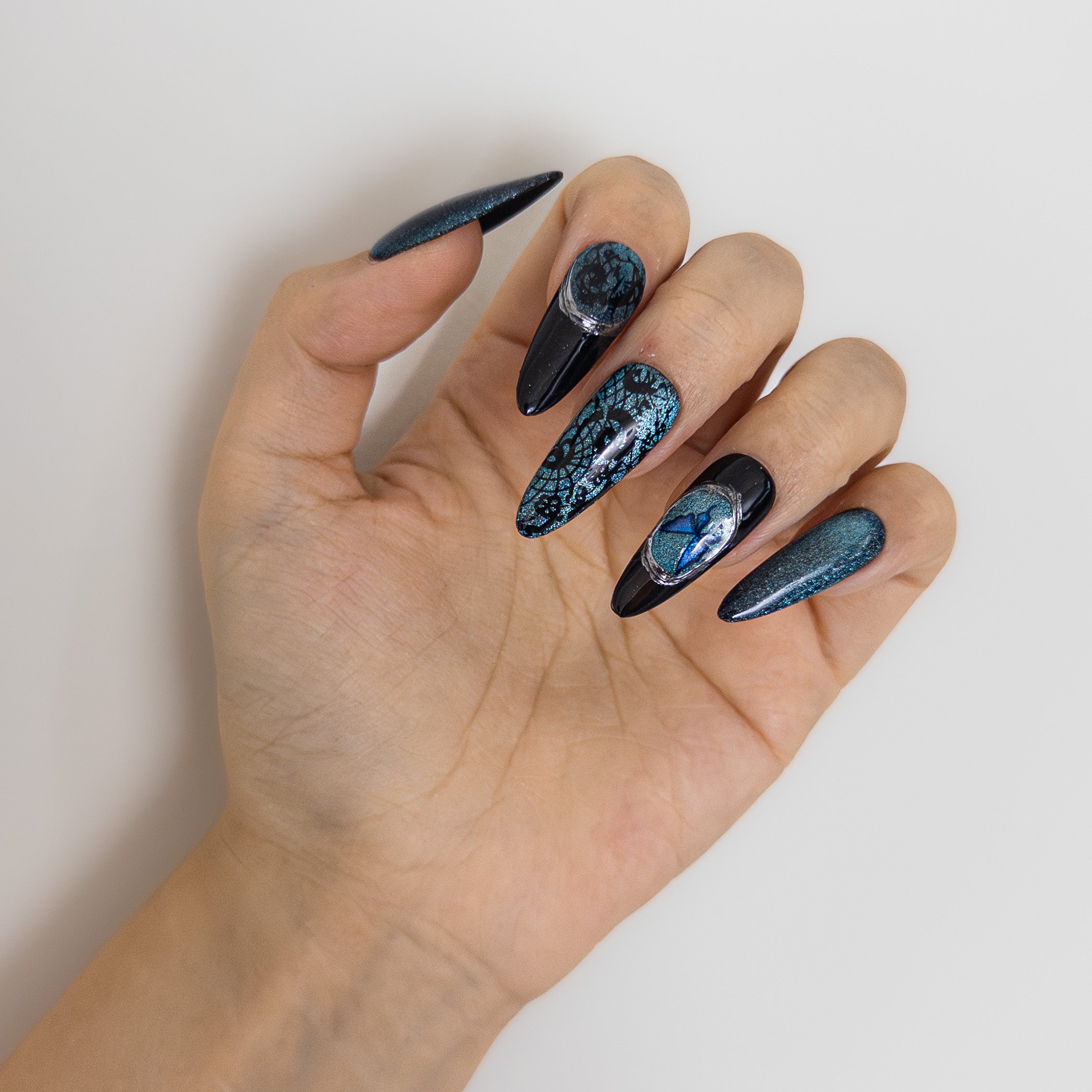 Underside view of durable structured gel nails showing smooth C-curve and high-gloss finish for a secure custom fit.