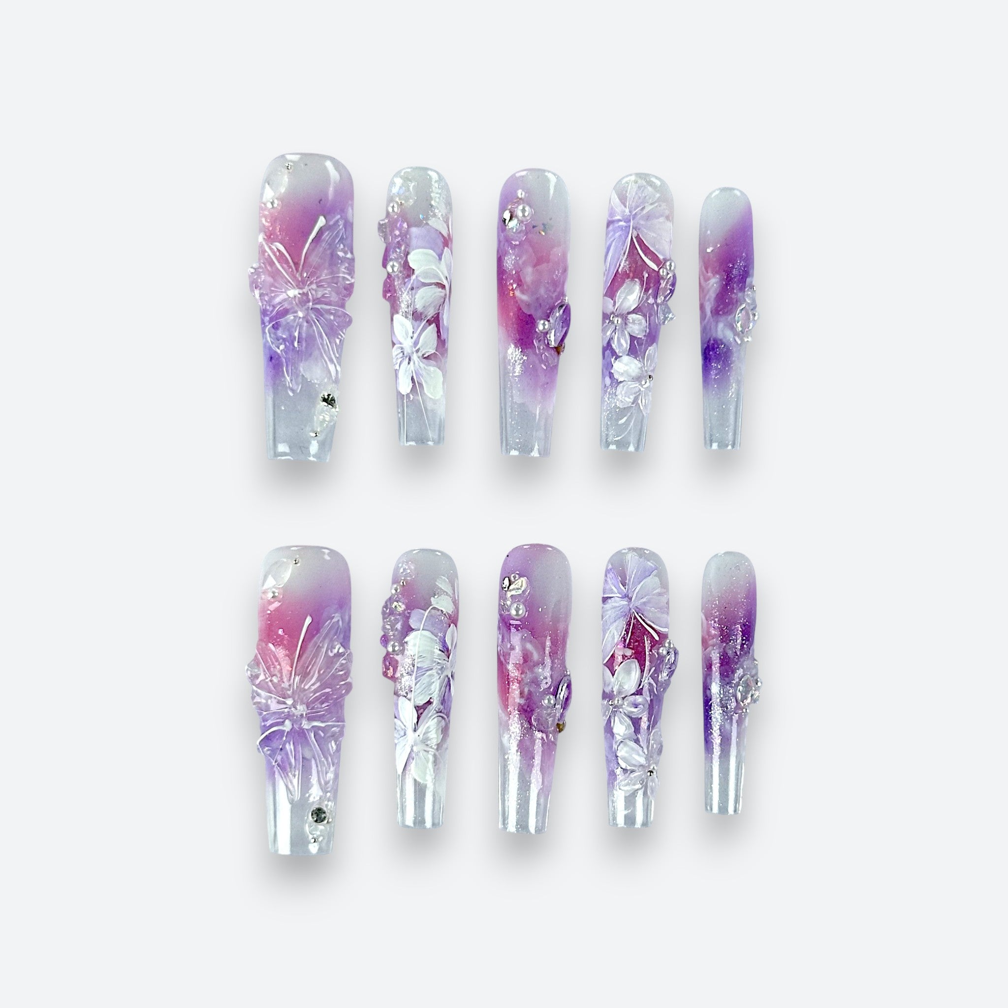 Full set of Velvetkay Purple Butterfly press-on nails in Coffin shape. Handcrafted butterfly art design.