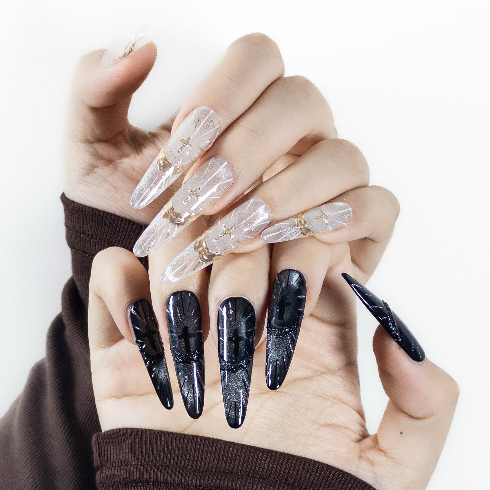 Close-up detail of Velvetkay Sanctum Glow press-on nails in Stiletto shape, showing handcrafted texture and edge finish.